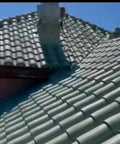 Heavy Duty Tile Roof Glaze And Clear Shielding Sealant With Urethane Reinforced Strength For Tough As Nails Weather Barrier And A Sleek Satin Finish That Gonna Save Your Tiles From Failing In A Practical Five Gallon Size on clay roof with well-aligned tiles.