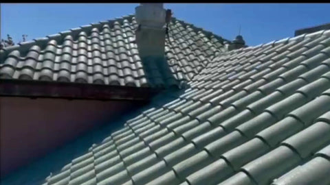 Heavy Duty Tile Roof Glaze And Clear Shielding Sealant With Urethane Reinforced Strength For Tough As Nails Weather Barrier And A Sleek Satin Finish That Gonna Save Your Tiles From Failing In A Practical Five Gallon Size on clay roof with well-aligned tiles.