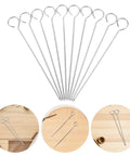 Stainless Steel Wick Needle Set For Candle Making Lightweight And Easy Threading 6 Inch Wick Centering Pin For Precise Wick Positioning In Aromatherapy Candles And DIY Craft Projects, set on wood