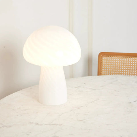 Mushroom Glass Table Lamp 12.75 Inch for Bedside Tables and Desks, emitting warm white glow on a marble surface