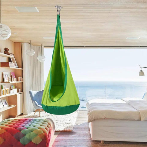 Level Up Your Daily Routine With These Rock Solid 2 Pack Wall And Ceiling Mount Brackets For Battle Ropes Gymnastic Rings Home Gym Straps And Hammocks Backing A Beefy 2800 Pound Load - green hanging hammock chair in a bright room.