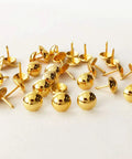 Snag Fifty Top Shelf Golden Upholstery Tacks For Sofa Headboard Wood Furniture Decoration Sleek Gold Hardware Studs in a bulk arrangement.