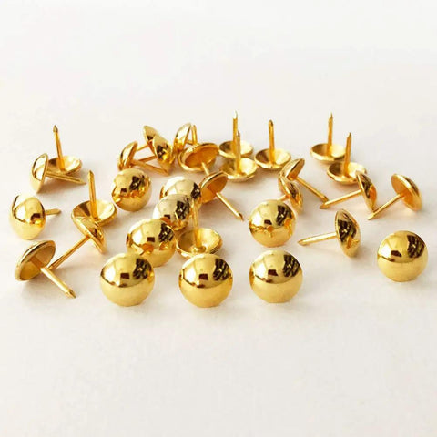 Snag Fifty Top Shelf Golden Upholstery Tacks For Sofa Headboard Wood Furniture Decoration Sleek Gold Hardware Studs in a bulk arrangement.