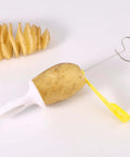 Manual tornado potato spiral cutter with white handle and metal spiral rod.