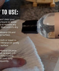 Applying Real Deal Food Grade Mineral Oil For Cutting Boards Includes A Wax Applicator to a cutting board with a cloth.
