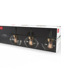 Box of Lofty Chic Three Light Vanity Light in dark bronze with clear glass shades and antique brass accents for modern bathroom decor.