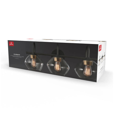Box of Lofty Chic Three Light Vanity Light in dark bronze with clear glass shades and antique brass accents for modern bathroom decor.