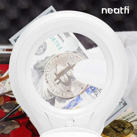 LED Bifocal Magnifying Lamp With 1,200 Lumens, Dual 2.25X And 6X Magnification, 5 Inch Glass Lens focusing on coins