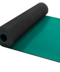 Side view of rolled anti-static rubber soldering mat, black top, green underside, 23.7 x 118 in