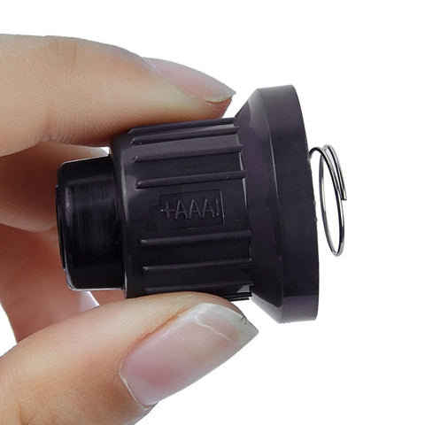 Close-up of a Two Pack AAA Battery Igniter Cap With Push Button Springs And Mounting Thread for Gas Fire Pit BBQ Grill Barbecue.