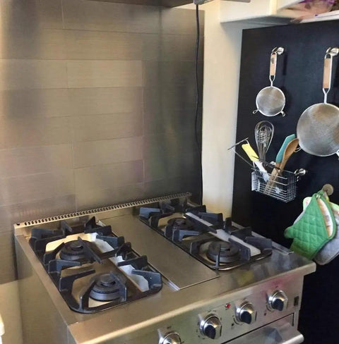 Stainless Steel Peel And Stick Kitchen Backsplash Tiles 4x12 Inch Self Adhesive Metal Tiles 30 Pack Dry Install No Mess Easy DIY Makeover Covers 10 Sq Ft above stainless steel stove.
