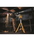 20V Max LED Work Light With Telescoping Tripod Stand 3000 Lumens 3 Modes Natural White Beam Cool To The Touch Portable Tool in use on jobsite