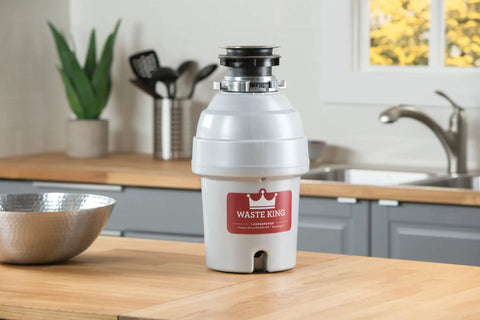 Ultra Fast Kitchen Garbage Disposal With Power Cord For No Fuss Install on wooden countertop, kitchen background visible