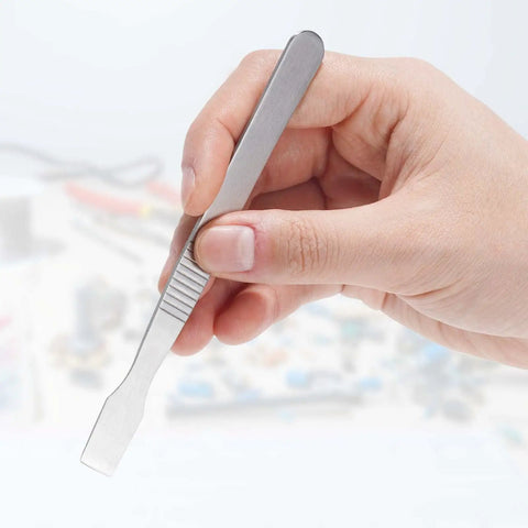 Close-up of hand holding stainless tool from 5 Piece Pro Flathead Pry Tool Set For Screen Opening And Repairs, rust-resistant edge