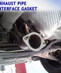 Two-piece metal exhaust flange gasket for car, close-up view with studs on flange