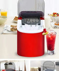 Sleek Countertop Ice Machine Cranking Out Thirty Three Pounds Of Snap Frozen Cubes In Six Minutes With Dual Sizes And No Sweat Setup For Weekend Bashes in red, producing ice.