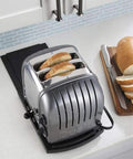 Sliding Tray Mat For Heavy Countertop Appliances No More Lifting Move Coffee Makers, Blenders, Air Fryers, Stand Mixers And Food Processors With Ease Under Cabinet Sliding Caddy For Kitchen Countertop Organization shown with a toaster and bread slices.