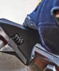 Heavy Duty Adjustable Wrench For Plumbing And Auto, Extra Wide Jaw Opening Up To 2.44 Inches, in use on a bolt