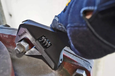 Heavy Duty Adjustable Wrench For Plumbing And Auto, Extra Wide Jaw Opening Up To 2.44 Inches, in use on a bolt