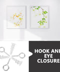 Drywall Self Drilling Anchors And Screws Kit with hook and eye closure next to decorative frames on wallboard.