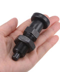 Heavy Duty Push Fit Ball Nose Spring Plunger With M20x1.5 Thread And 1.3 Inch Length held in hand, showcasing durable black carbon steel.