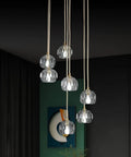 Sleek Modern Crystal Pendant Light With Seven LED Crystals, Adjustable Brass Plating Frame, K9 Crystal Ball Chandeliers in room