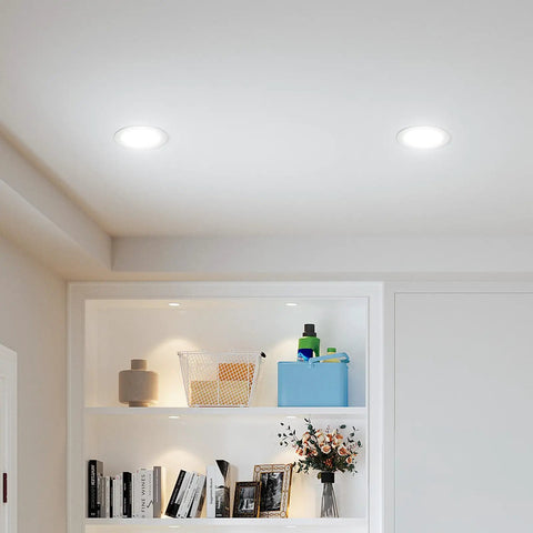 Ceiling view of 16 Pack 4 Inch Ultra Thin LED Recessed Ceiling Light With Junction Box 5 CCT Selectable 2700K 3000K 4000K 5000K 6000K Dimmable 11W 800 Lumen Output Equivalent To 70W ETL Listed Easy Install illuminating a modern living room