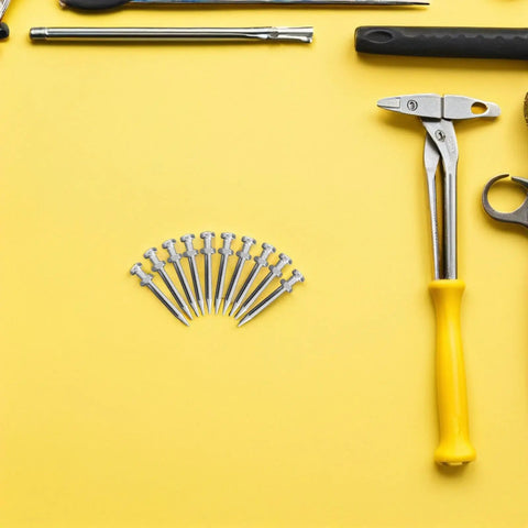 Lawn Aerator Shoes Spikes 5.8cm Steel Replacement Spikes For Manual Gardening, 20 Pack on yellow background, surrounded by tools.