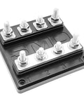 Premium Quality Heavy Duty SMD Quad Fuse Block With Solid Aluminum Busbar And Clear Tough Cover Bulletproof Protection To Keep Your Ride Wiring Safe And Rock Solid, showing base and connections.
