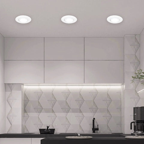 Pack Of 10 Flush Mount MR16 Spotlight Fixtures With Swivel Bracket in a modern kitchen setting, matte white finish