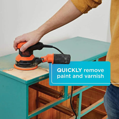 Person using Random Orbit Sander 5 Inch 2.4 Amp With Built In Dust Bag on a cabinet to remove paint and varnish quickly.