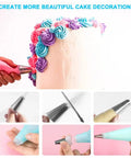Dope 104 Piece Cake Decorating Tool Set With Turntable Piping Tips Scrapers Molds And Bag Caps in use for frosting a cake