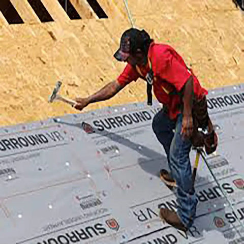 Top Tier Roofing Underlayment Delivers Ultra Lightweight Coverage In 48 Inch Wide By 250 Foot Rolls For Lightning Fast Deck Prep And Bulletproof Weather Blocking being installed by a worker.