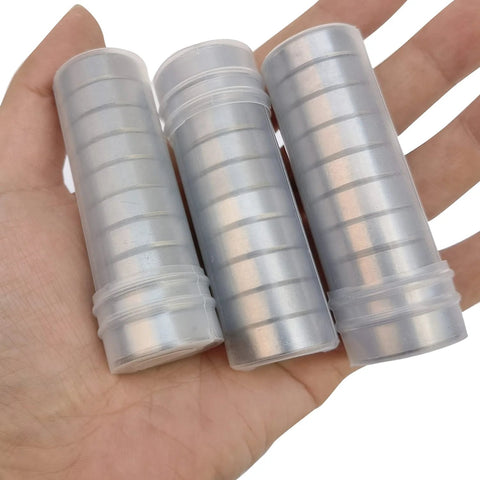 Hand holding 24 pack rubber sealed ball bearings in plastic tubes
