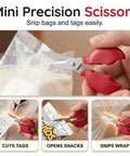 Close-up of mini scissors from Three In One Handy Crab Shaped Kitchen Tool With Magnetic Bottle Opener cutting plastic bag