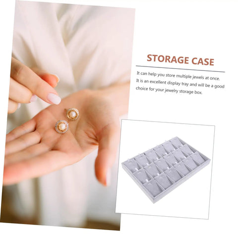 Lowkey Perfect Multi Grid Jewelry Tray For Rings And Necklaces With Smart Dividers To Keep Your Daily Treasures Sorted And Secure While Adding Those Chill Vibes To Any Vanity Or Desk Corner Setup with earrings in hand.