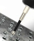 Close-up of Magfixer K5 high-magnetic screwdriver drill bit engaging a screw on a metal surface; 25–150mm set