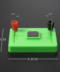 Green base of Electric Motor Model And Electromagnetic Swing Kit For Classroom Learning with metal connectors.