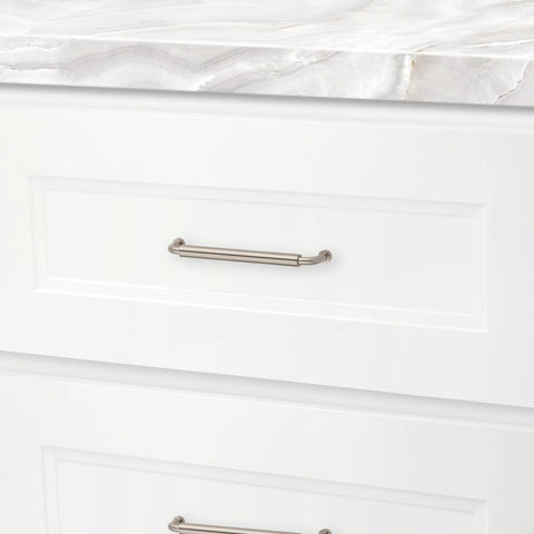 Hollywood Hills 4486 Cabinet Pull 6 Inch Center To Center Solid Brass Hardware installed on white kitchen drawer