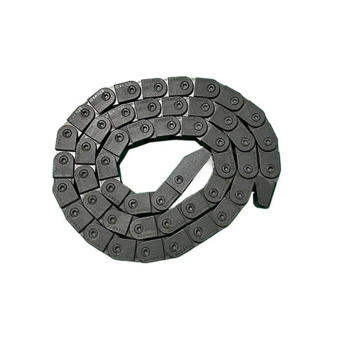 Heavy Duty Plastic Cable Drag Chain With End Connectors For CNC 3D Printers And Routers Offering Hella Smooth Wire Management And Sweet Organized Routing In Matte Black One Meter Long laid out in a spiral shape.