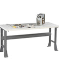Heavy-Duty Fixed Leg Workbench With Durable Plastic Laminate Top, 96 By 36 Inch Badass Industrial Garage Station Bench, Built Like A Tank For Heavy Tools, Gray Finish with tools on top.