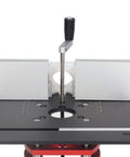 Heavy Duty Router Lift Base With Precision Top Plate Insert For Woodworking Slotting Trimming Chamfering Table Adjustment System Heavy Hitter Smooth Operator Built Tough Rock Solid Real Deal Black, top view showing aluminum plate and adjustment handle.