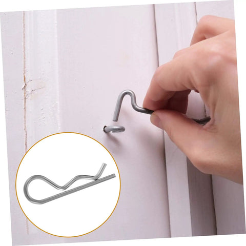 Versatile Cotter Pin Clips Set For Trailer Hitches And Equipment 20 Pieces Spring Fasteners installed in wooden surface