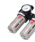 Close-up of oil water separator filter regulator FRL combination for air compressors with dual transparent canisters and gauge