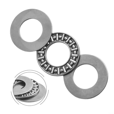 Thinking Process:. needle roller thrust bearing with steel washers, close-up of compact axial load bearing set