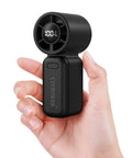 Hand holding Go-To Ultra Portable Personal Mini Fan With Lanyard USB Rechargeable 100 Speed Turbo Cooling Pocket Size