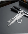 Heavy Duty Auto Body Sheet Metal Clamp Pliers With Wide Duckbill Jaw for welding, shown on a workbench near tools