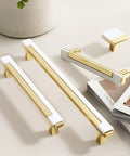 Set Of 10 White And Gold Cabinet Pulls For Kitchen Cabinets And Drawers Handles Zinc Alloy Hardware displayed on table