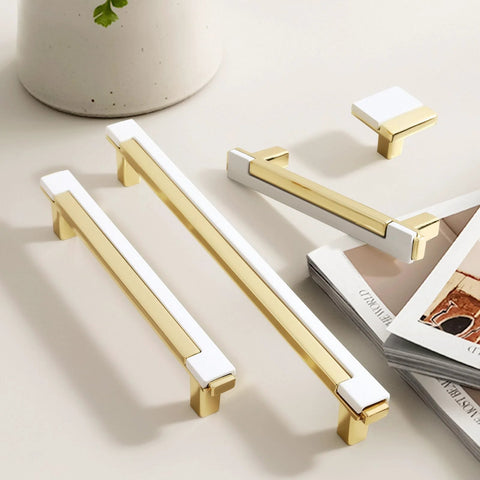 Set Of 10 White And Gold Cabinet Pulls For Kitchen Cabinets And Drawers Handles Zinc Alloy Hardware displayed on table