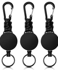 Three Pack Retractable Keychain With Heavy Duty Carabiners And Badge Holders, Extendable Reel For IDs And Keys, 60 Centimeter Cord And 1 Millimeter Wire Rope, Ultra Durable Lanyard Black showing three black retractable keychains with metal carabiners.